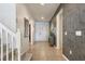 Welcoming foyer with stylish decor, a console table, and an open view of the home's interior at 8801 Macapa Dr, Kissimmee, FL 34747
