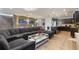 Comfortable living room flows into a large dining space, with an adjacent modern kitchen at 8801 Macapa Dr, Kissimmee, FL 34747