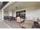 Spacious covered patio with outdoor seating and a view of the backyard at 8801 Macapa Dr, Kissimmee, FL 34747