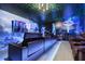 Fantastic theater room complete with reclining seats, a big screen, and custom movie-themed decor at 8801 Macapa Dr, Kissimmee, FL 34747