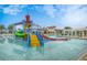Fun community pool water feature with slides and a splash zone for endless Gathering fun and entertainment at 8801 Macapa Dr, Kissimmee, FL 34747