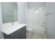 Modern bathroom with a combination tub/shower and vanity at 922 Wild Date Ln, Lake Mary, FL 32746