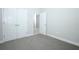 Bedroom featuring a large closet and plush carpet at 922 Wild Date Ln, Lake Mary, FL 32746