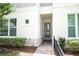 Inviting front entrance with brick pathway and stone accents at 922 Wild Date Ln, Lake Mary, FL 32746