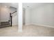 Spacious living area with stairway access and natural light at 922 Wild Date Ln, Lake Mary, FL 32746