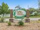 Lake Butler Estates community sign, a deed restricted community, with decorative landscaping and stone accents at 112 Lake Butler Ave, Haines City, FL 33844