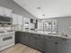 Stylish kitchen with granite countertops and modern appliances at 112 Lake Butler Ave, Haines City, FL 33844