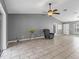 Spacious living room with neutral walls and a comfortable seating area at 112 Lake Butler Ave, Haines City, FL 33844