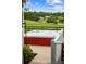 Scenic view of a red hot tub on an outdoor deck, overlooking the property at 12434 Sullivan Rd, Clermont, FL 34715