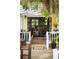 Cozy outdoor patio with stylish seating, perfect for relaxing and enjoying the natural surroundings at 12434 Sullivan Rd, Clermont, FL 34715