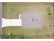 Birds eye view of a home showing the roof and driveway at 1303 Congo Ct, Kissimmee, FL 34759