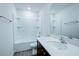Modern bathroom with a vanity and shower-tub combo at 1303 Congo Ct, Kissimmee, FL 34759