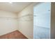 Walk-in closet with shelving for ample storage, next to the bedroom at 1303 Congo Ct, Kissimmee, FL 34759