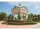 Providence community entrance featuring a grand, gated structure with manicured landscaping and signage at 137 Drayton Ave, Davenport, FL 33837