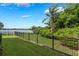Fenced backyard with beautiful water view at 1400 Lake Shadow Cir # 10104, Maitland, FL 32751