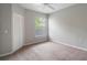 Bedroom featuring neutral paint, carpet, a window with blinds, and a closet at 1400 Lake Shadow Cir # 10104, Maitland, FL 32751