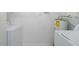 Functional laundry room with washer, dryer and water heater at 1400 Lake Shadow Cir # 10104, Maitland, FL 32751
