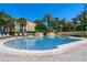 Community swimming pool with seating and nearby apartment building at 1400 Lake Shadow Cir # 10104, Maitland, FL 32751