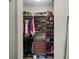 Walk-in closet features custom shelving and ample storage space for shoes, clothes, and accessories at 14038 Bluebird Park Rd, Windermere, FL 34786