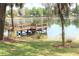 Picturesque wooden fishing pier with beautiful lake views, ideal for leisurely days at 14038 Bluebird Park Rd, Windermere, FL 34786