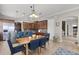 Well-appointed kitchen with modern appliances, a breakfast bar, and a seamless flow to the living area at 14038 Bluebird Park Rd, Windermere, FL 34786