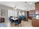 Charming kitchen with breakfast bar seating and stainless steel appliances at 14038 Bluebird Park Rd, Windermere, FL 34786