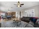 Open-concept layout with seamless transition from the living room to the kitchen and dining area at 14038 Bluebird Park Rd, Windermere, FL 34786