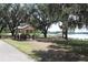 Relax in the park gazebo and enjoy serene views of the lake and surrounding nature at 14038 Bluebird Park Rd, Windermere, FL 34786