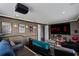Home theater offering a large screen, comfortable seating, and a premium cinematic experience at 14038 Bluebird Park Rd, Windermere, FL 34786
