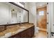 Bathroom featuring granite counters, and an open door to a tiled shower at 1425 Dunbrooke Loop, Longwood, FL 32779