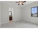Cozy bedroom featuring neutral carpeting with easy access to a modern bathroom at 1425 Dunbrooke Loop, Longwood, FL 32779