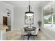 Eat-in dining area with tile flooring, light fixture, and views to the backyard at 1425 Dunbrooke Loop, Longwood, FL 32779