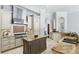 Kitchen with granite countertops, stainless steel appliances, and an island with breakfast bar at 1425 Dunbrooke Loop, Longwood, FL 32779