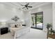 Tranquil main bedroom with tray ceilings, and a sliding glass door to the backyard at 1425 Dunbrooke Loop, Longwood, FL 32779