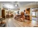 Open concept living room with hardwood floors, elegant decor, and plenty of room for entertaining at 149 Spanish Bay Dr, Sanford, FL 32771