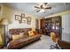 Functional home office with a futon, wood desk, bookcase, and ample natural light for comfortable work or relaxation at 149 Spanish Bay Dr, Sanford, FL 32771