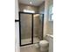 Bathroom showing a modern glass enclosed shower at 15095 Grove Lake Dr, Winter Garden, FL 34787