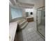 Spacious bathroom features tub, shower and sinks at 1586 Antoinette Ct, Oviedo, FL 32765
