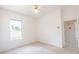 A bright bedroom with a window and view to the outside at 1586 Antoinette Ct, Oviedo, FL 32765