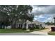 Well maintained single story home with manicured lawn, mature trees, and ample curb appeal at 1586 Antoinette Ct, Oviedo, FL 32765