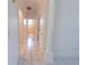 Hallway with tile floor leading to bathroom at 1586 Antoinette Ct, Oviedo, FL 32765