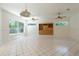 Open floor plan featuring lots of light and a decorative cabinet at 1586 Antoinette Ct, Oviedo, FL 32765