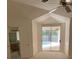 Bright main bedroom with sliding glass doors leading to the pool area at 1586 Antoinette Ct, Oviedo, FL 32765