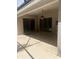 Covered patio area with ceiling fan and sliding glass doors, offering a seamless indoor-outdoor living experience at 1586 Antoinette Ct, Oviedo, FL 32765