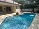 Sparkling screened-in pool with a spacious patio area, perfect for outdoor entertaining and relaxation at 1586 Antoinette Ct, Oviedo, FL 32765