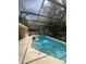 Enclosed private pool featuring clear blue water and ample space for outdoor lounging and enjoyment at 1586 Antoinette Ct, Oviedo, FL 32765
