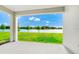 The backyard boasts a view of the lake at 1596 Contentment Loop, Kissimmee, FL 34744