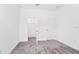 Cozy bedroom with plush gray carpet and a closet is perfect for storage at 1596 Contentment Loop, Kissimmee, FL 34744