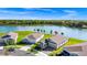 Beautiful home with a three-car garage and great lake views at 1596 Contentment Loop, Kissimmee, FL 34744