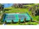 Enjoy a match at the community's tennis courts with landscaped surroundings at 1596 Contentment Loop, Kissimmee, FL 34744